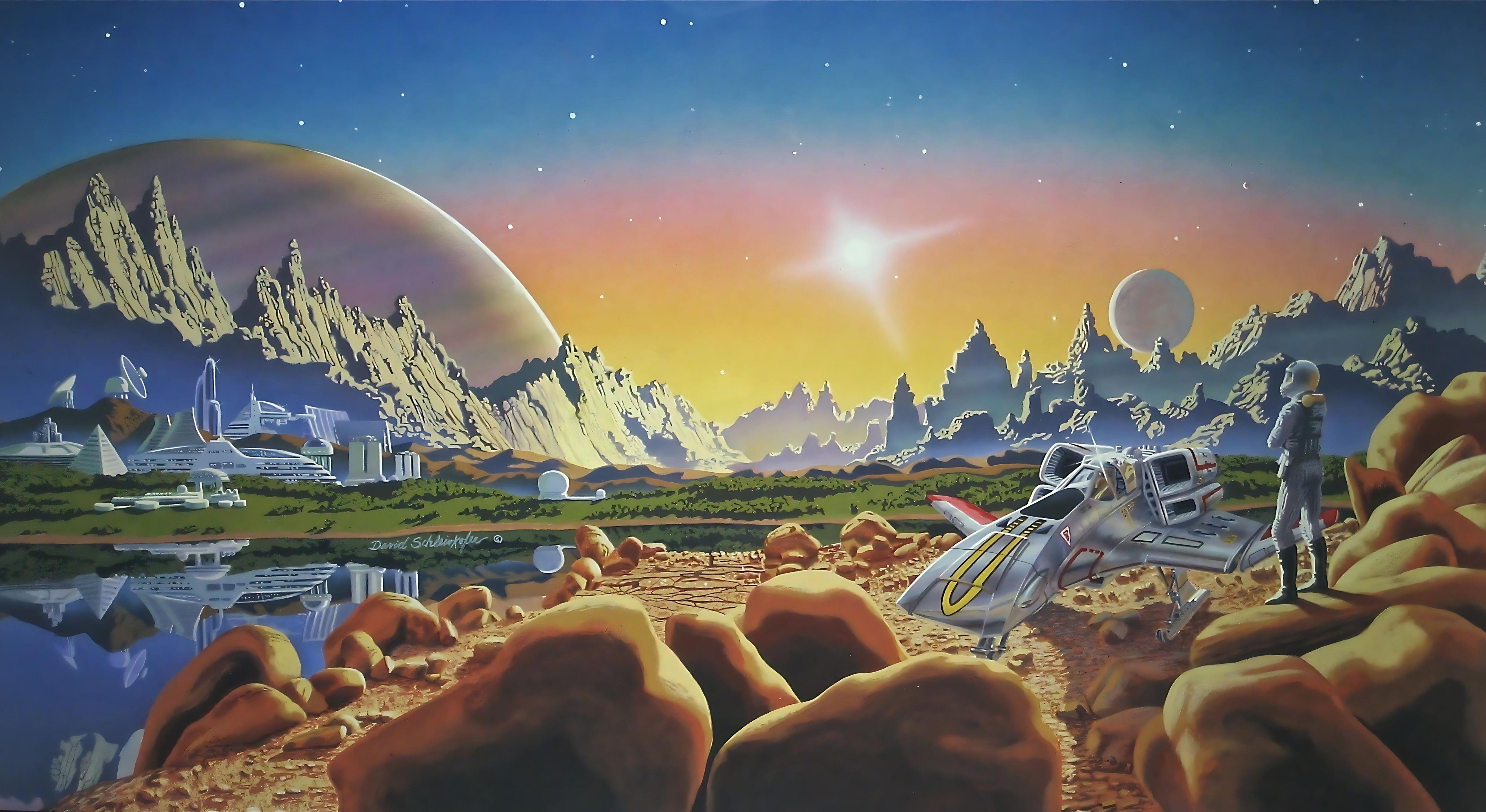 An image of an astronaut gazing across a mountain range